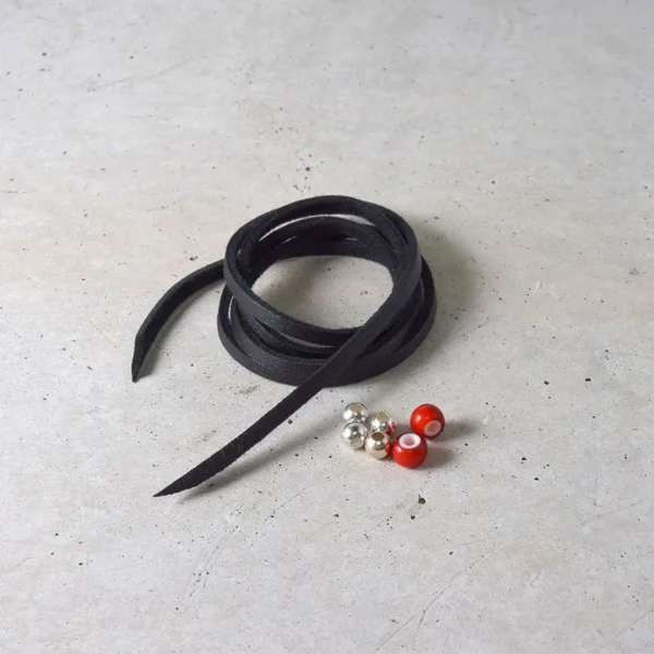 Black Deerskin String and Red White Heart Beads