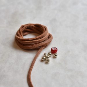 Natural Deerskin String and Red White Heart Bead